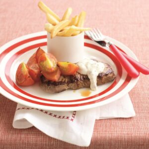 Steak with creamy mustard sauce and oven chips