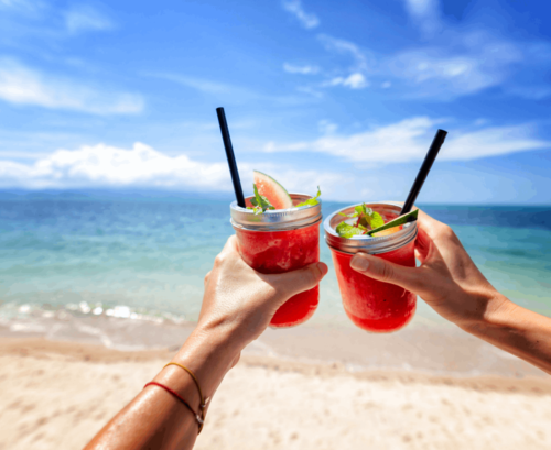 Sharing drinks on a beach