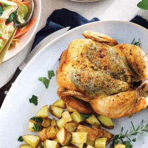 Roast herb chicken and potatoes with tangy kohlrabi slaw