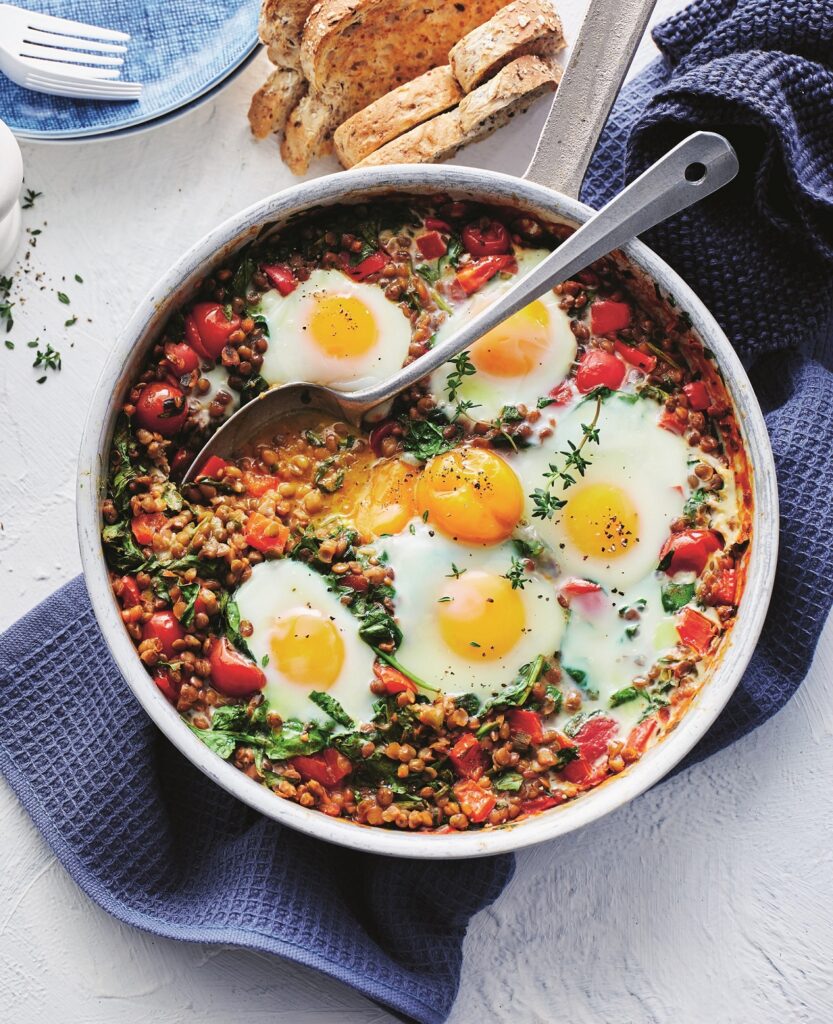 Mexican baked eggs with tomatoes and lentils