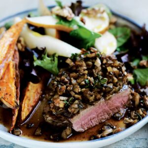 Mushroom and thyme-crusted beef with pear salad