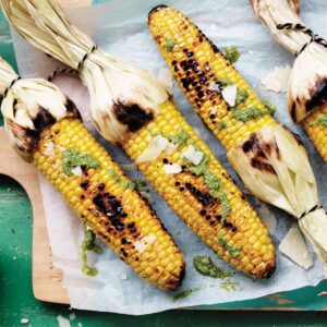 Grilled corn with pesto and parmesan
