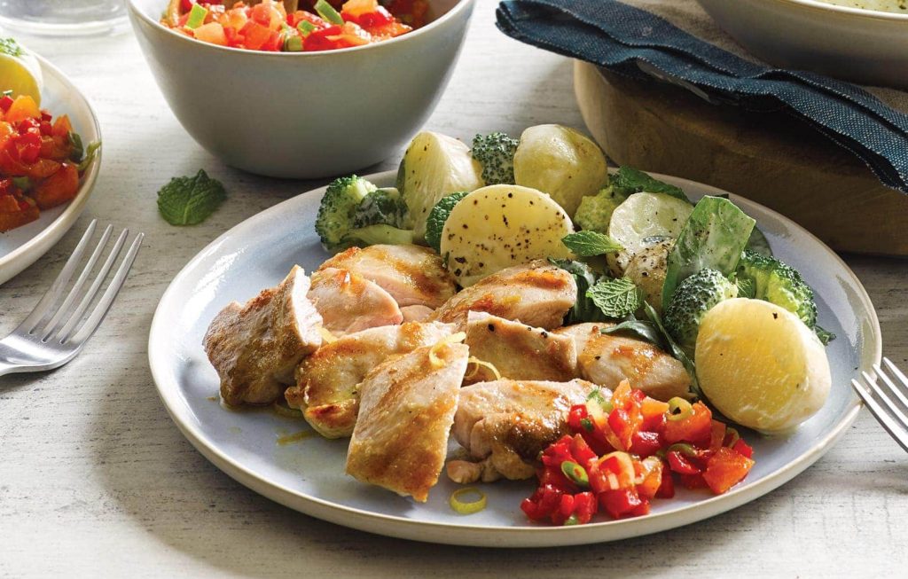Grilled chicken with creamy potato salad and fresh apricot salsa