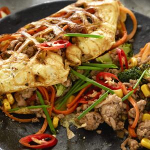 Egg net omelette with spicy pork and veges
