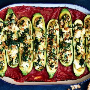 Spinach, pine nut and ricotta stuffed courgette bake