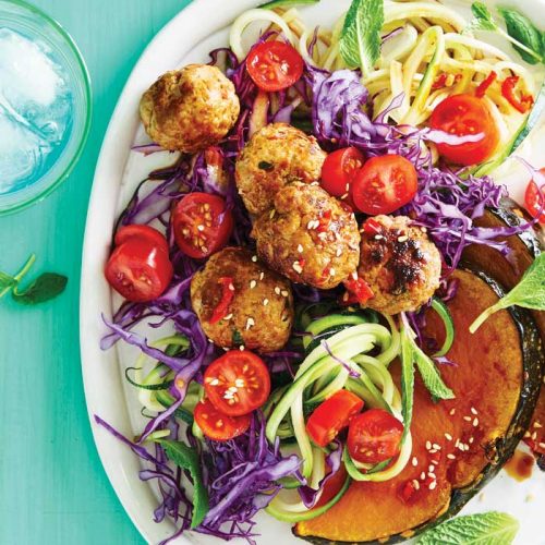 Spicy pork meatballs with roasted pumpkin and cabbage salad