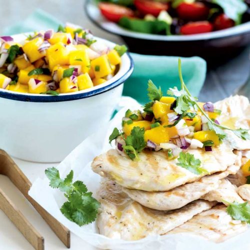 Grilled chicken with mango salsa and bean salad