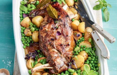 Slow-cooked lamb shoulder with peas, mint, potatoes and broad beans