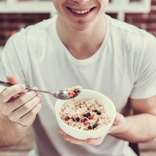 Man eating bowel-friendly oatmeal