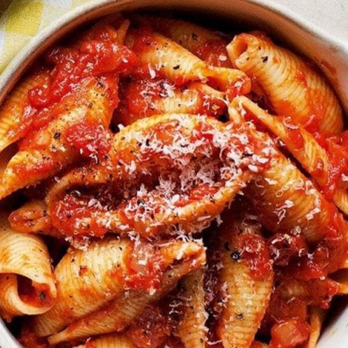Healthier conchiglie pasta in rich tomato sauce