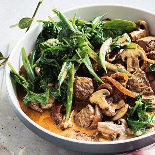 Beef and mushroom stroganoff with garlic spinach and beans