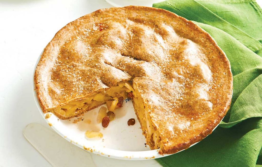 Apple pie with a slice taken out