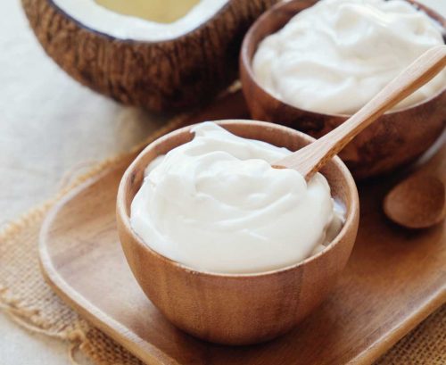 Coconut yoghurt and a coconut shell