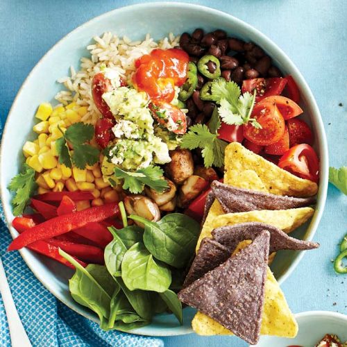 Black bean and mushroom bowl with loaded guacamole