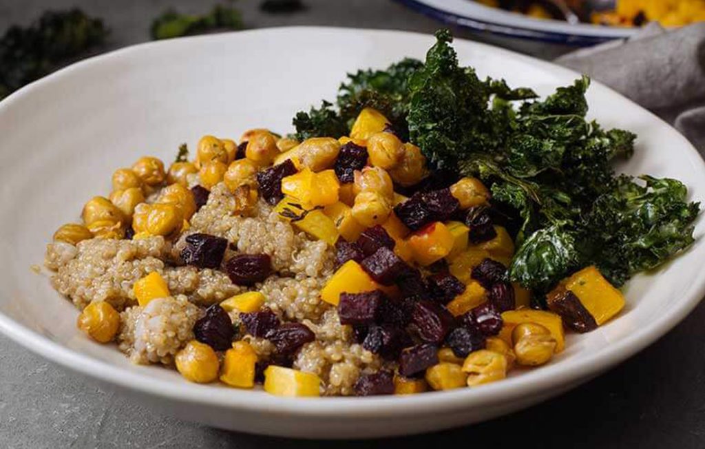 Spiced coconut quinoa with pumpkin, beetroot and kale crisps