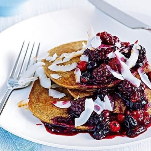 Healthy banana pancakes with berry compote
