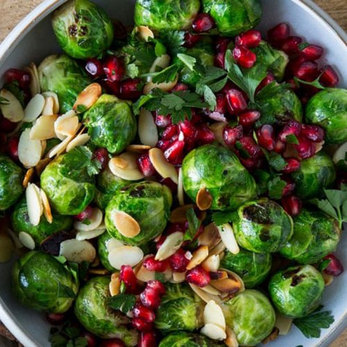 Pomegranate brussels sprouts with flaked almonds