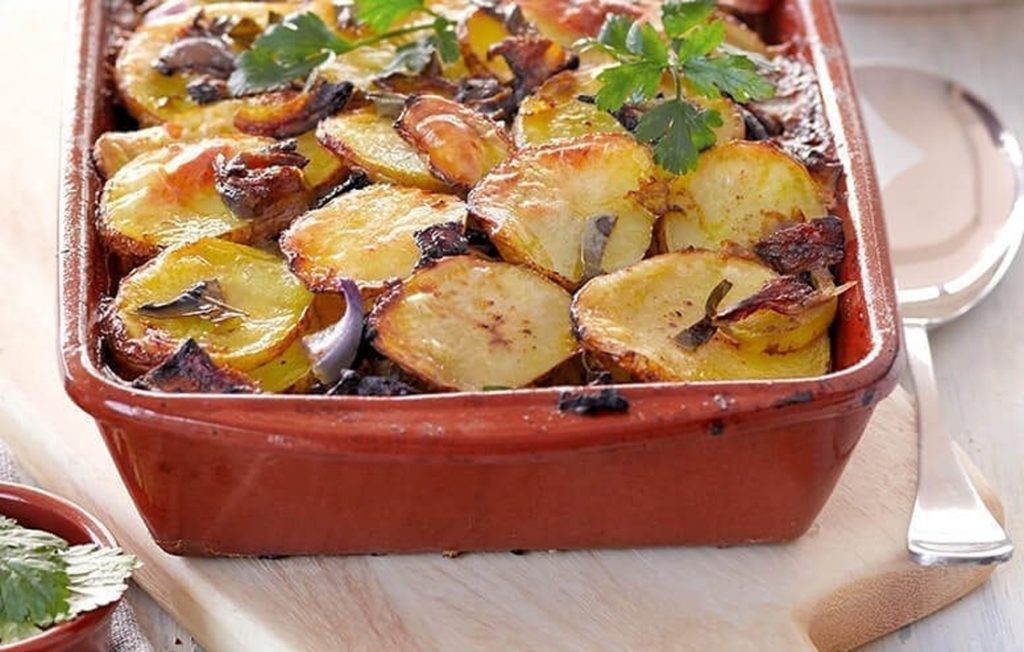 Healthier harissa-spiced potato bake