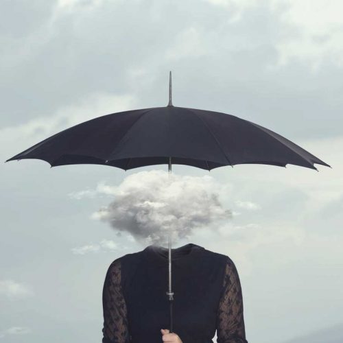Woman with cloud for a head holding an umbrella