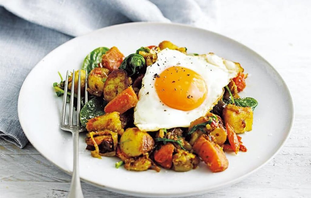Indian-spiced bubble and squeak with fried eggs
