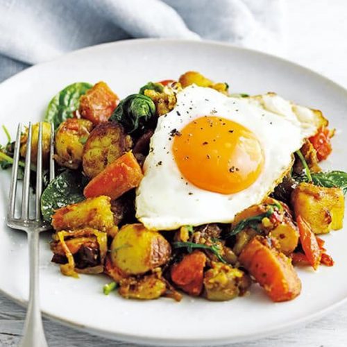 Indian-spiced bubble and squeak with fried eggs
