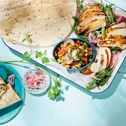 Chicken shawarma wraps with quick pickled onions and tahini sauce