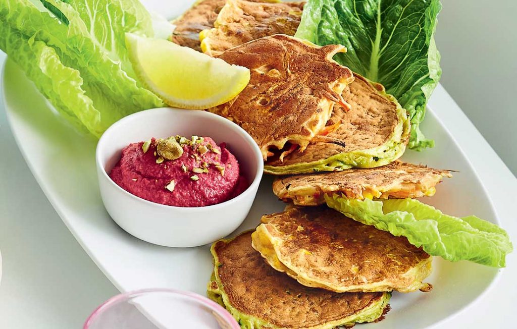 Mixed veggie fritters with beetroot and pistachio hummus
