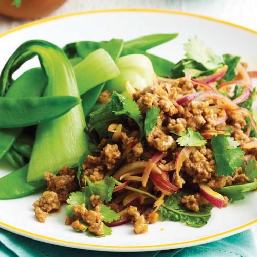 Pork larb with steamed Asian greens