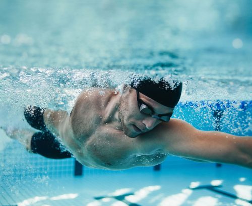 Man swimming freestyle