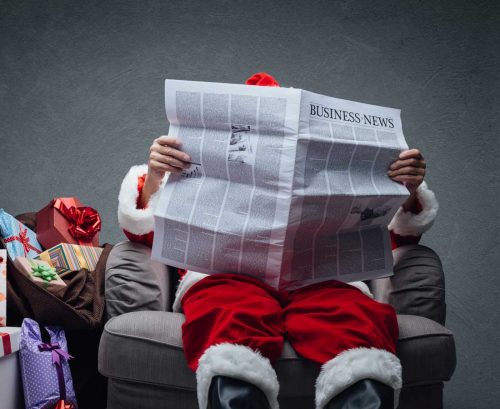 Santa reading the paper