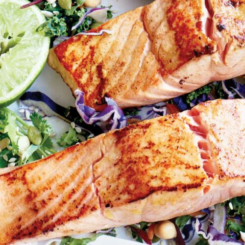 Barbecued salmon and kalesaw with honey and lime dressing
