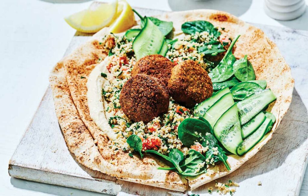 Falafel wraps with hummus and pickled cucumber
