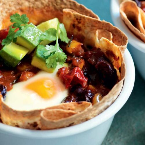 Mexican baked eggs in tortilla baskets
