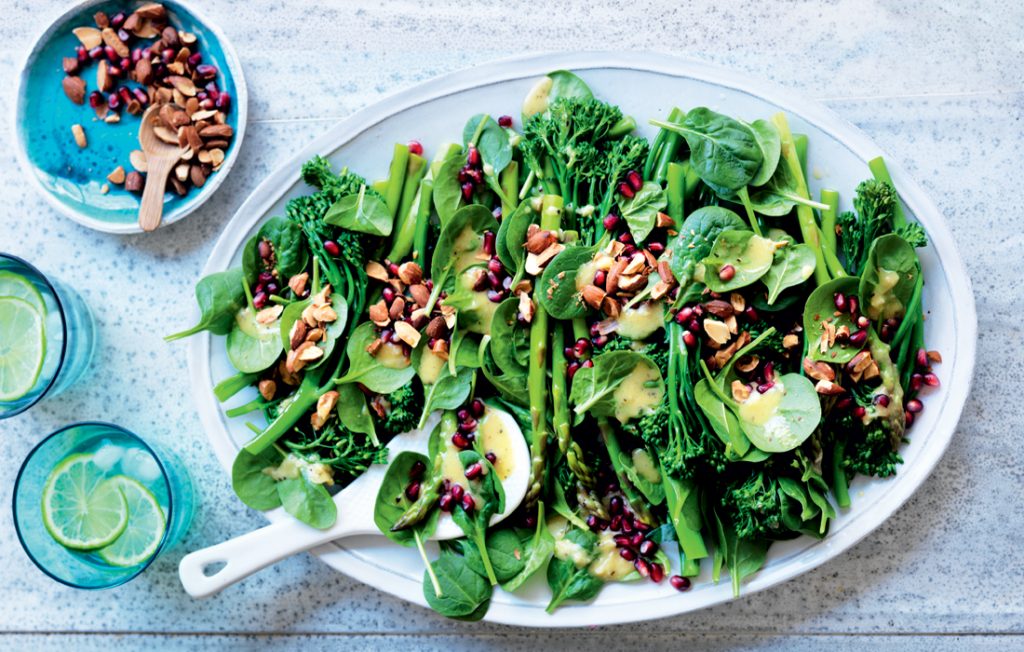 Asparagus, almond and pomegranate salad with roasted garlic dressing