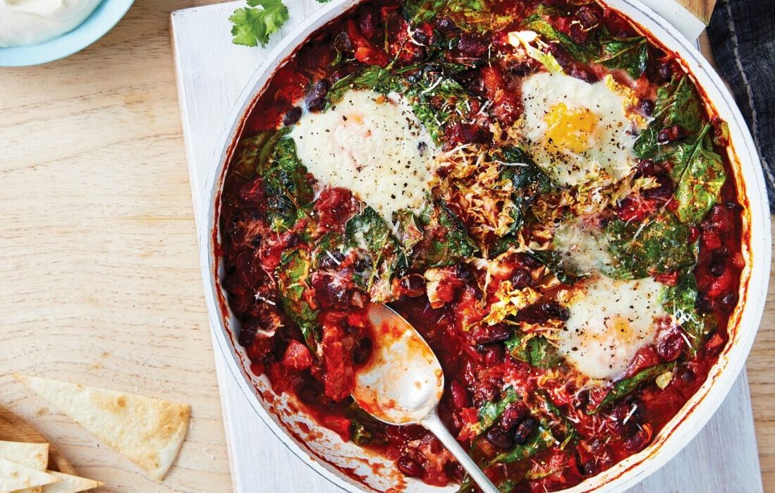 Chipotle bean chilli with baked eggs - Healthy Food Guide