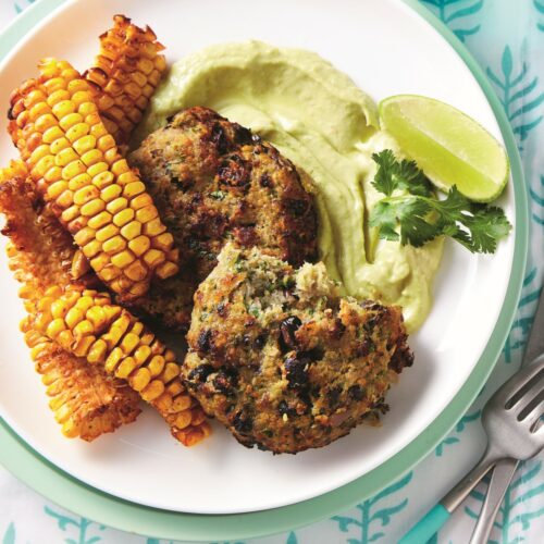 Air-fryer fish cakes with smoky corn ribs and avocado sauce  