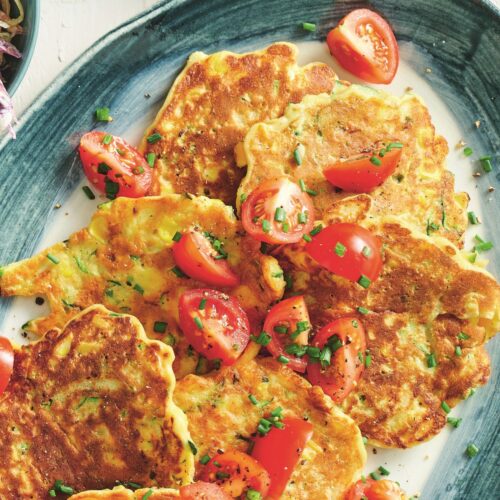 Corn and zucchini fritters with tomatoes
