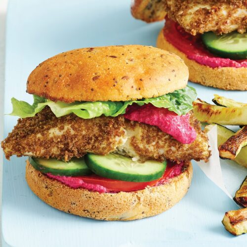 Crumbed fish fillet burgers with beetroot sauce